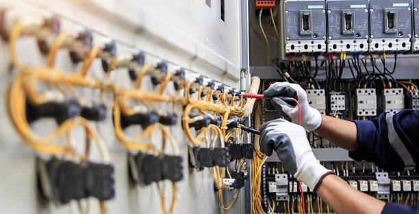Professional Electrician technician working in Elm Springs, AR
